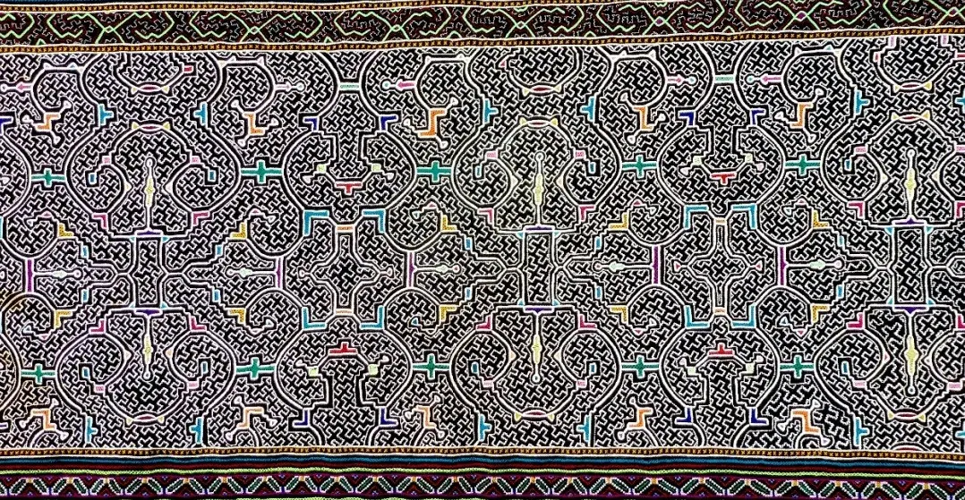 Geometry replication within textile artwork created by indigenous Shipibo people