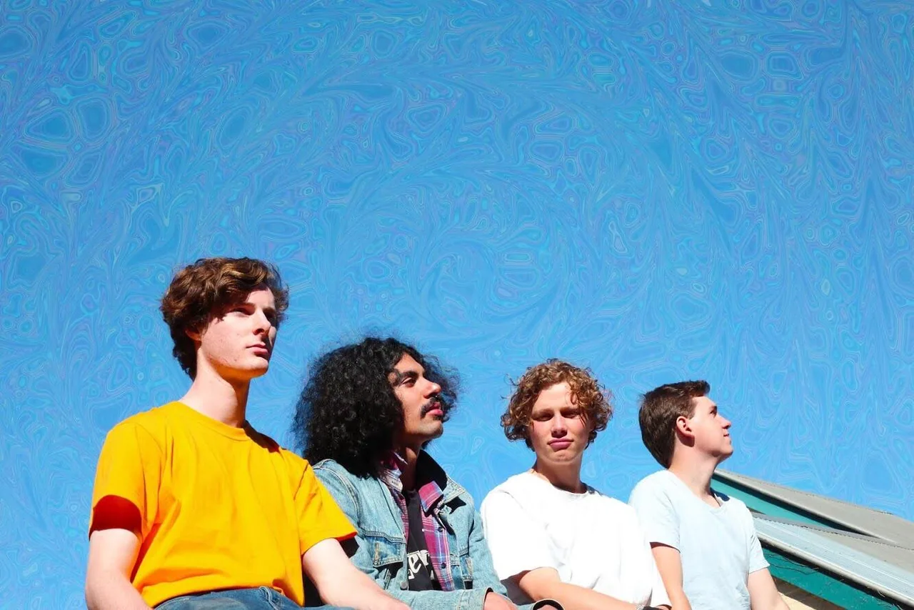 My friends are in a fantastic psychedelic rock band, and asked me to take pictures for them. I wanted the sky to reflect their sound