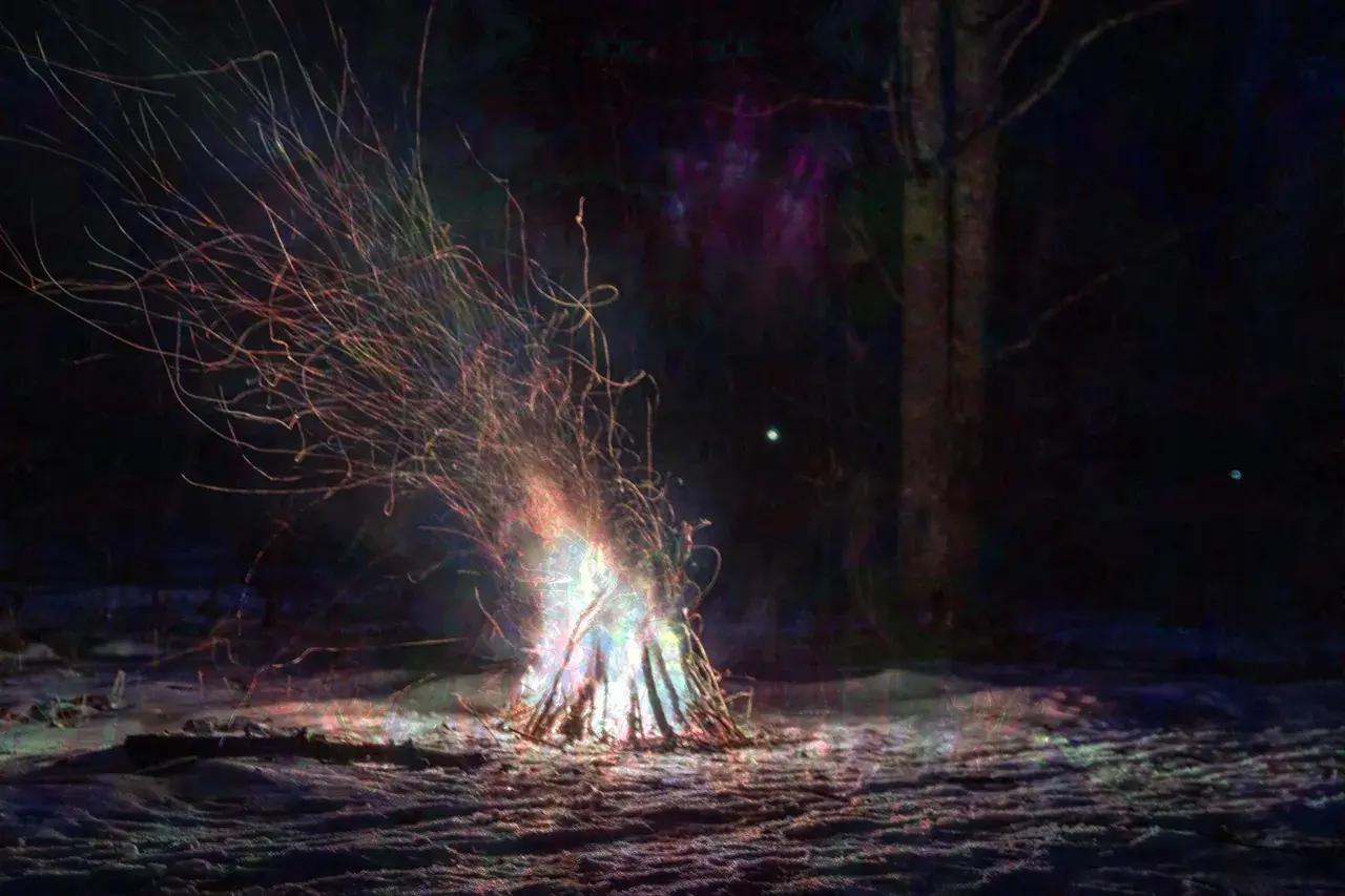 The presence of the violet flame. One cold night sitting still. deep in meditative state purple hue appeared next to the fire.