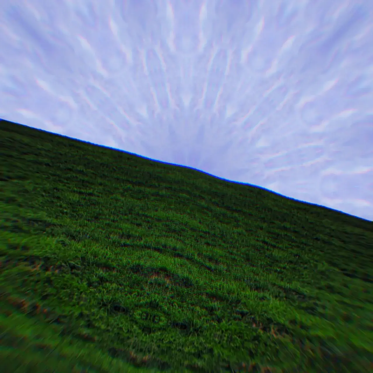 Rippled Sky over Green Hill