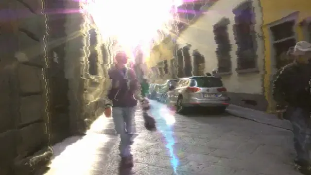 Facing the sun in the street