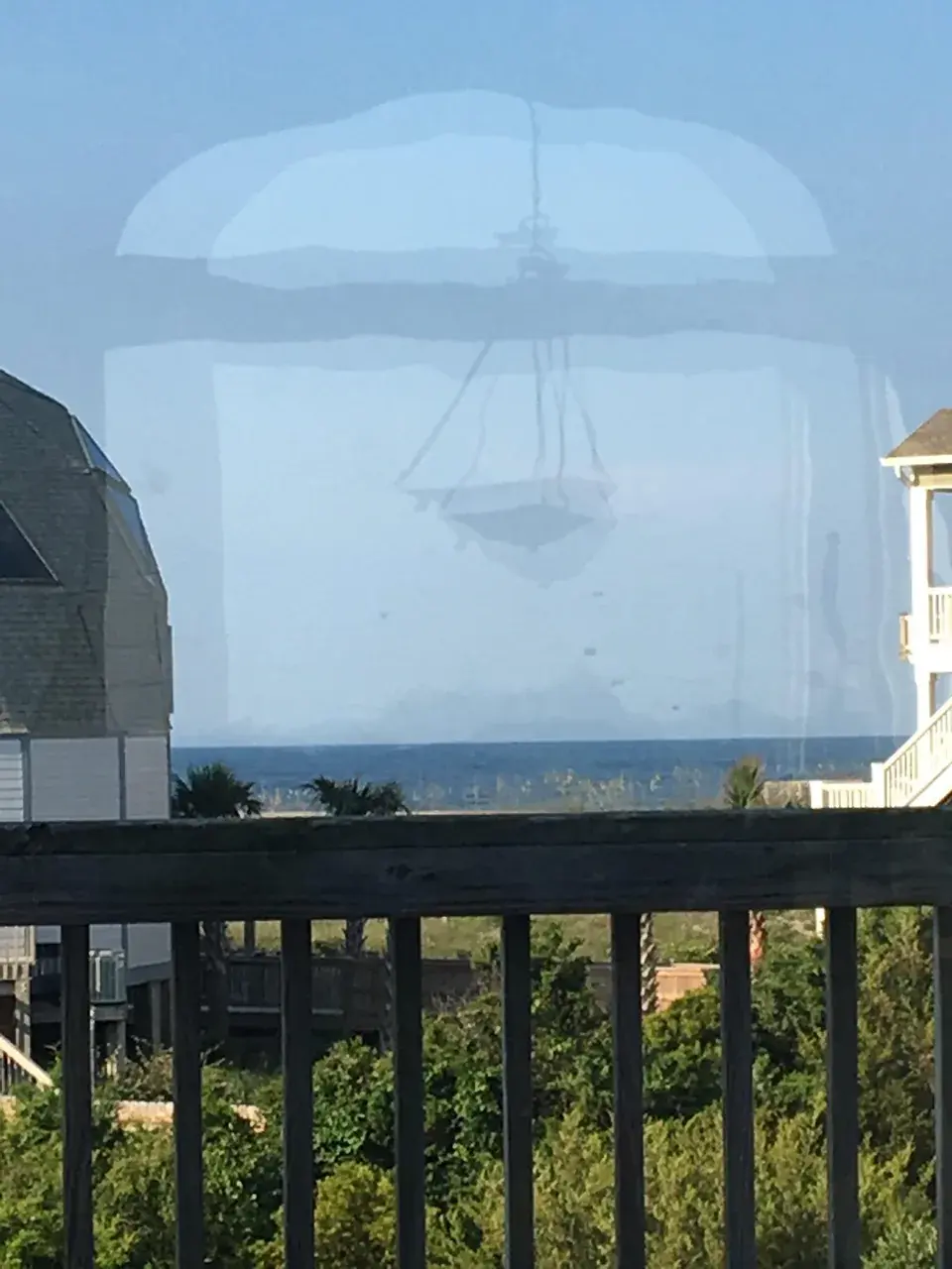 The glass door made an interesting reflection replication